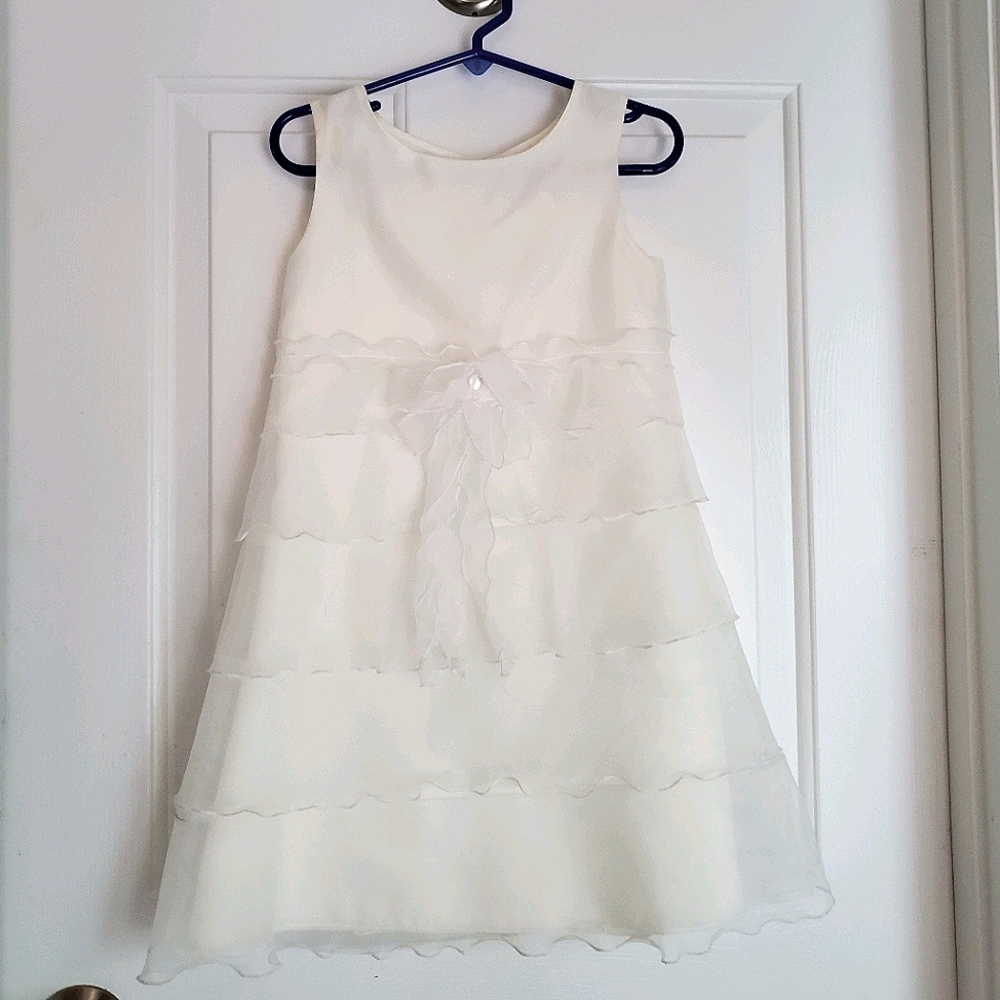 A beautiful white dress in a girl's size 5